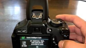 how to turn on the flash on a canon camera