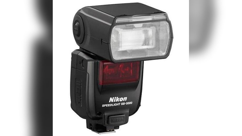what is the purpose of a speedlight flash