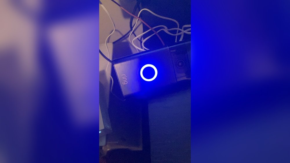 why is my ring camera flashing blue when charging